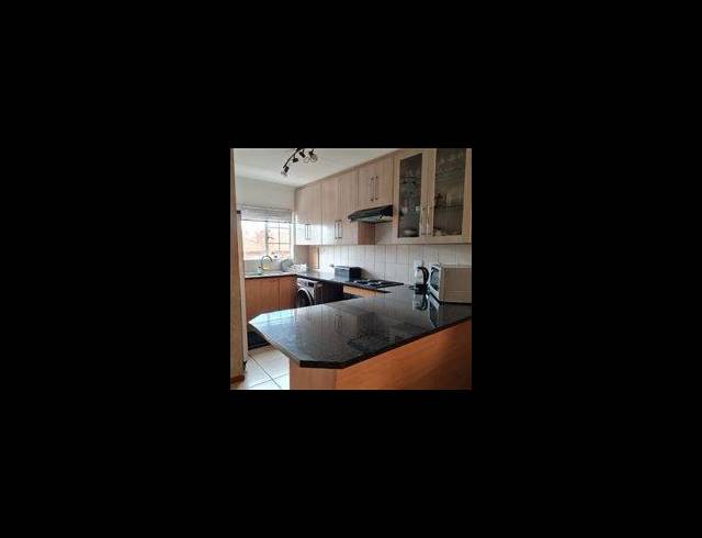 2 BEDROOM TOWNHOUSE FOR SALE IN ROOIHUISKRAAL NORTH